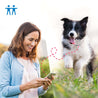 A human and a dog wearing the Tractive GPS Tracker.