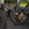Black dog lying in a Kurgo Wander  Car Hammock.