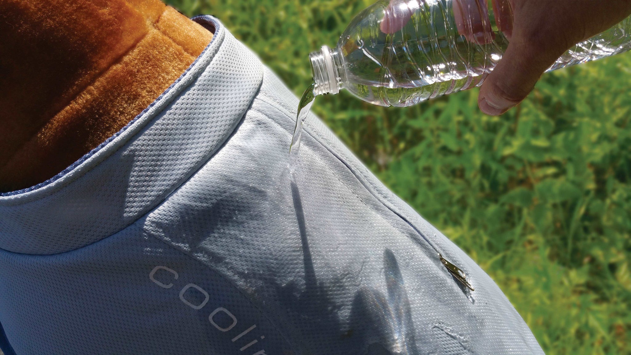 Applying water to the Kurgo dog cooling vest 