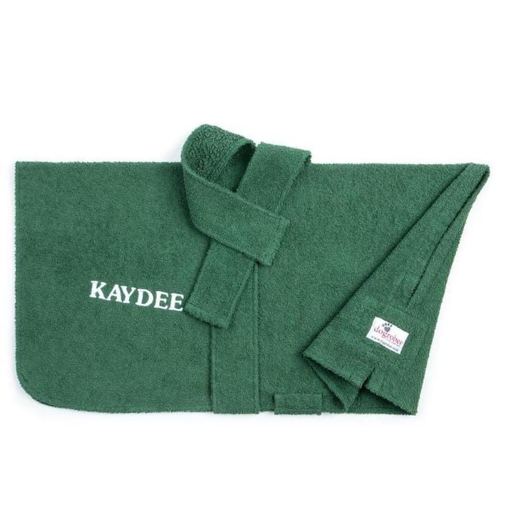 A folded green Dogrobes dog drying coat  personalised  with a dog's name