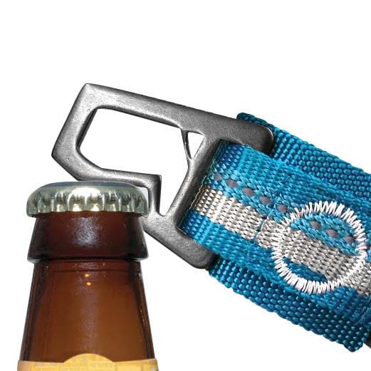 Close up view of the Kurgo RSG Collar bottle opener in use
