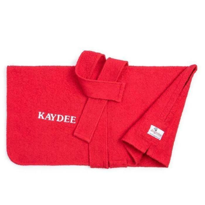 A red, personalised Dogrobes dog drying coat